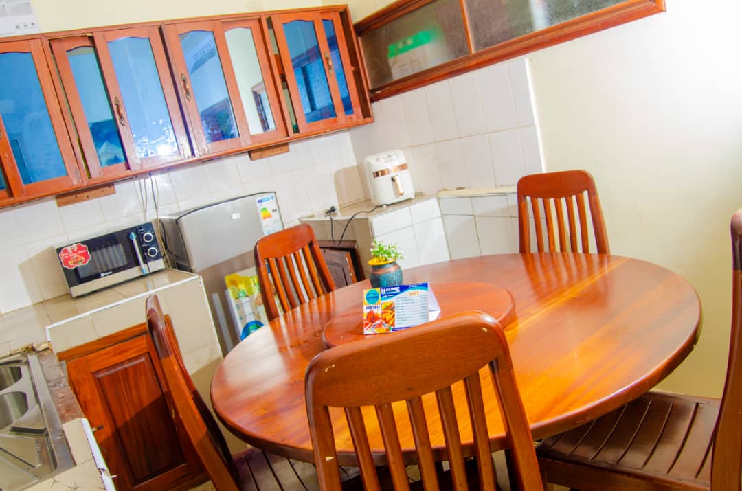 Dining table and kitchen area